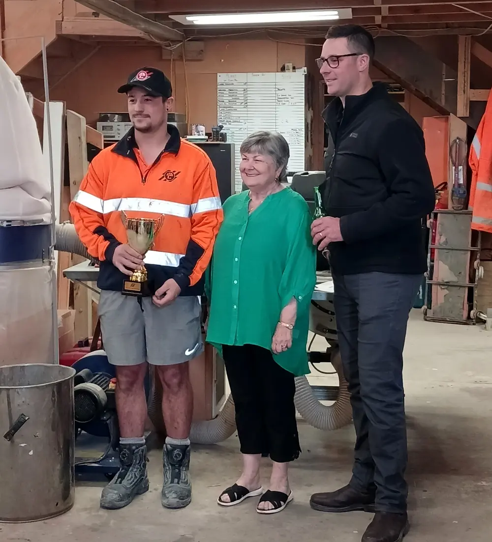 Antony, Marg Hart and Hayden with Trevor Hart Memorial Trophy