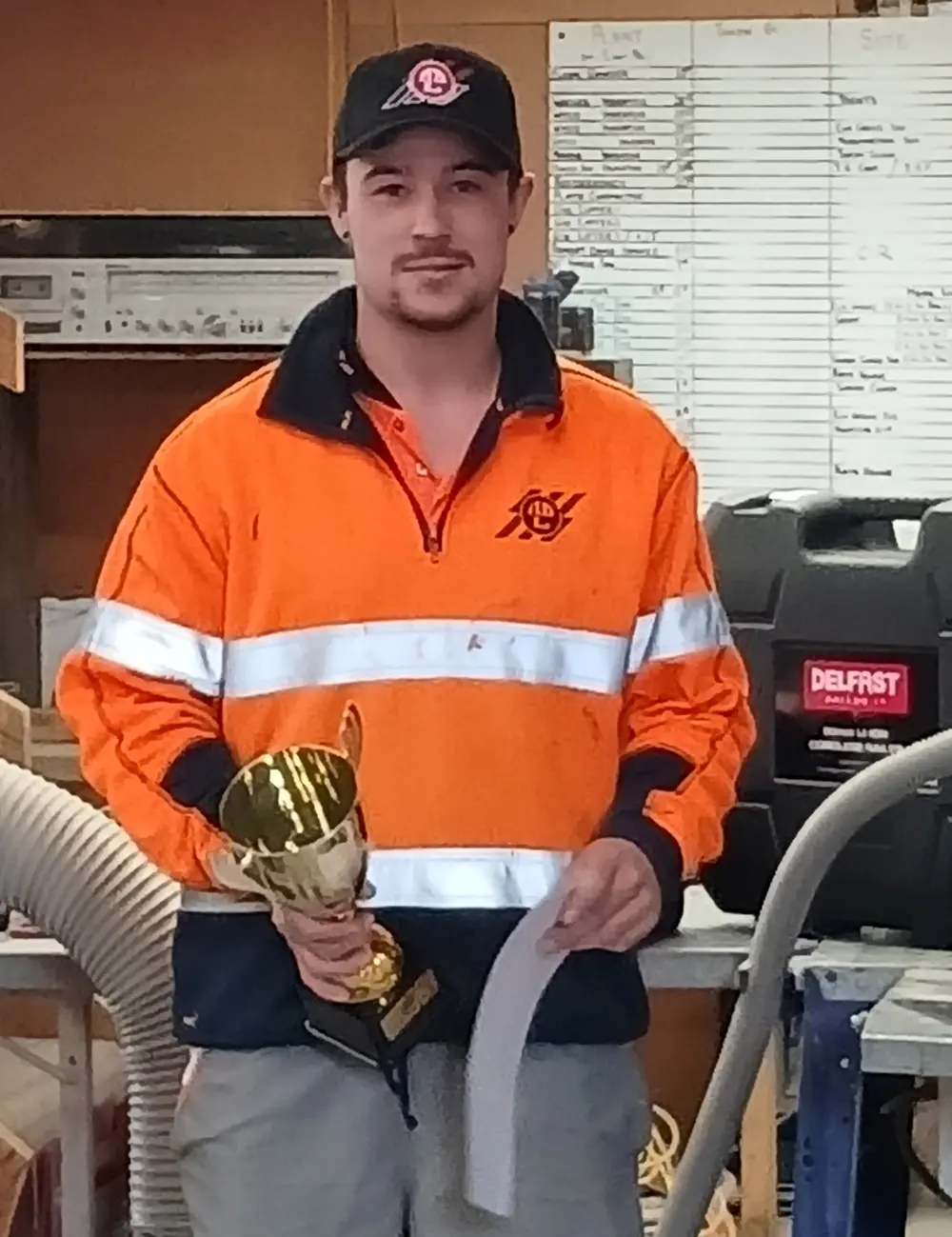 Antony with the Trevor Hart Memorial Trophy for Apprentice of the Year - Dunedin Team